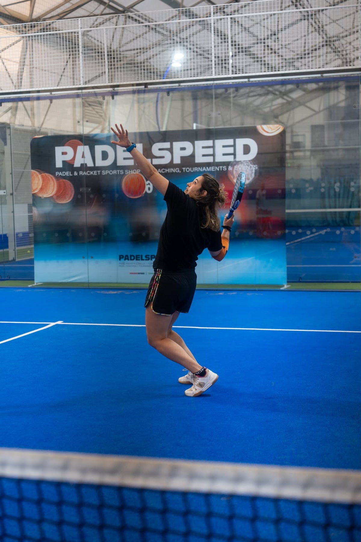 Irene Anthi preparing an overhead shot at Padelspeed, Cardiff
