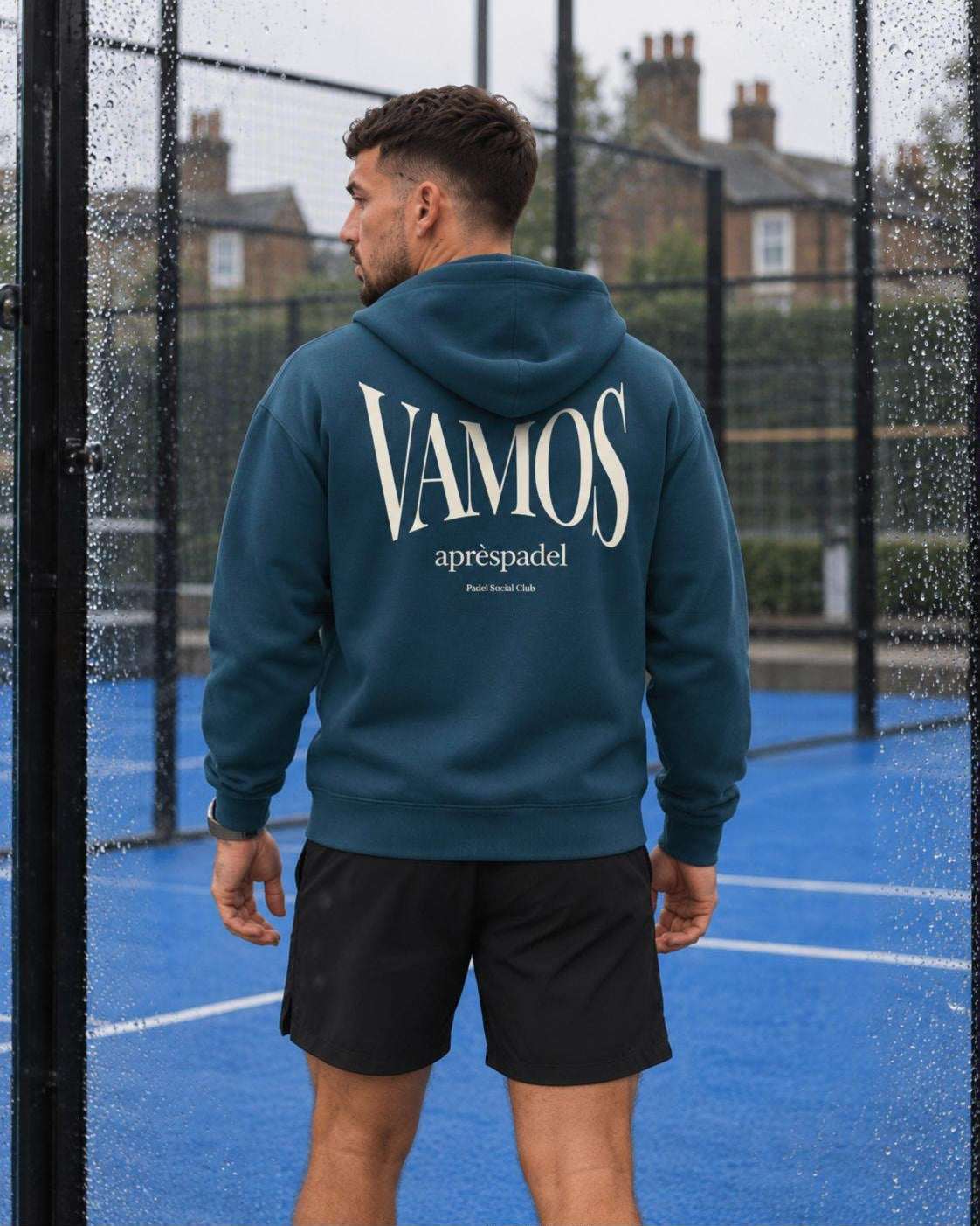 AP Club Vamos Hoodie in Stargazer with cream VAMOS back print on a wet padel court